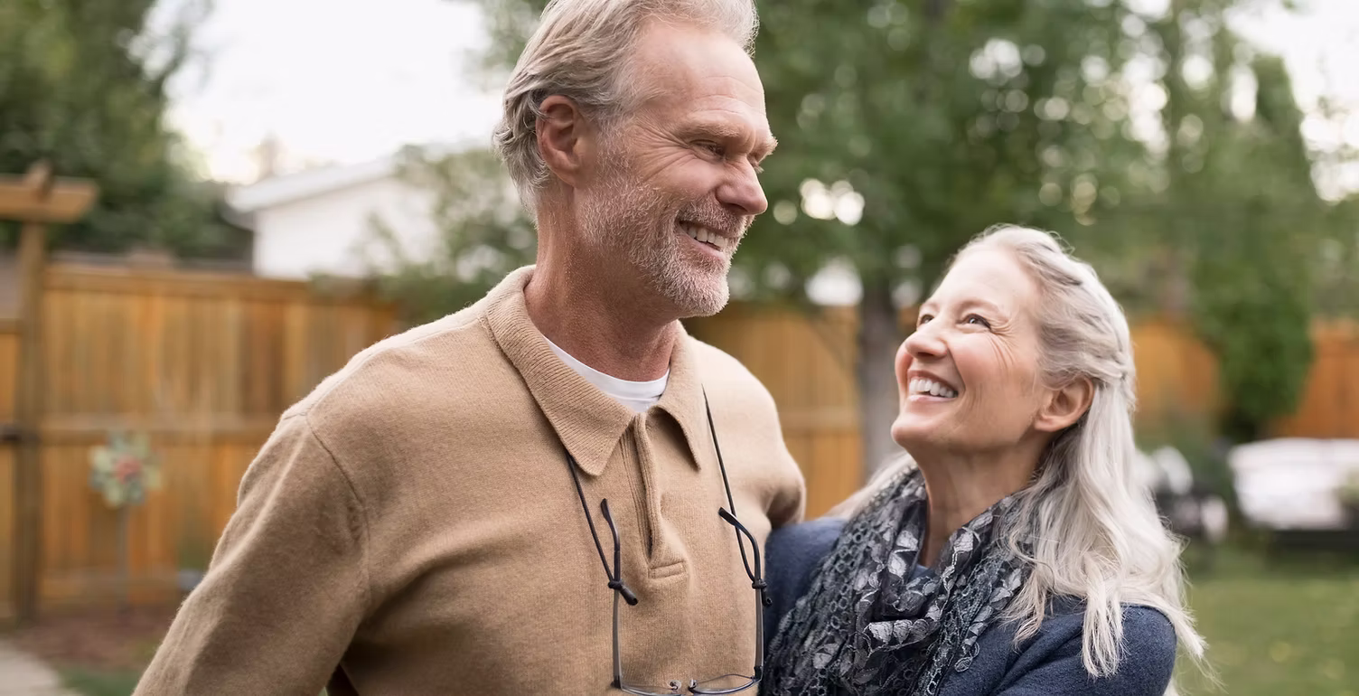 Smiling older couple outdoors